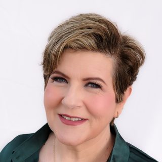 Adriana Giuca — Managing Director